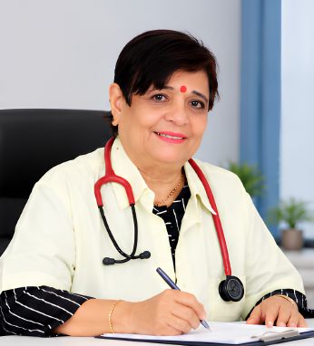Dr Pushpa Multani consulting a patient
